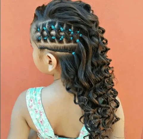 Curly Hairstyle With Braids And Beads