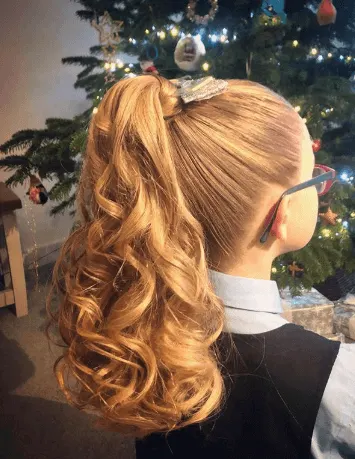 High, Curly And Voluminous Ponytail