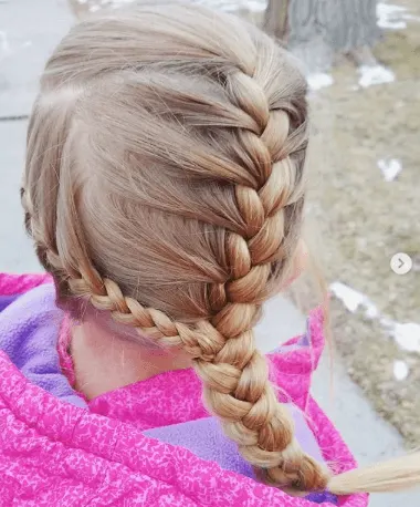 Uniquely Braided Hairstyle With Side Pony