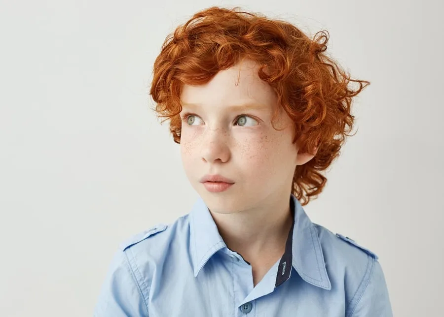 boy with medium curly hair