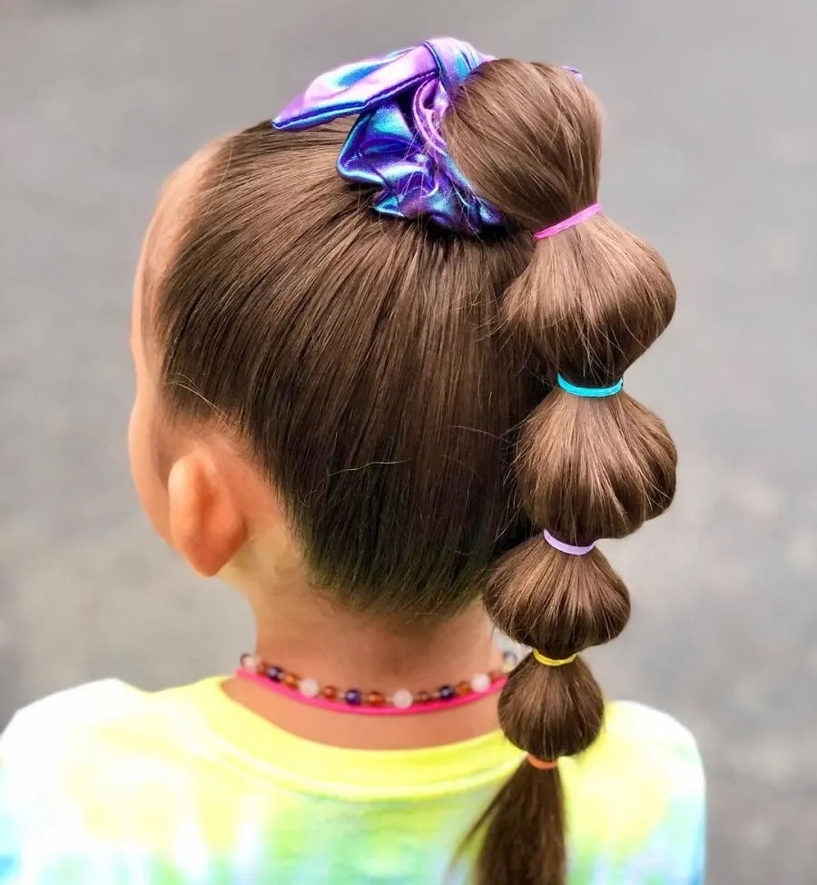 10 year old girl with bubble ponytail