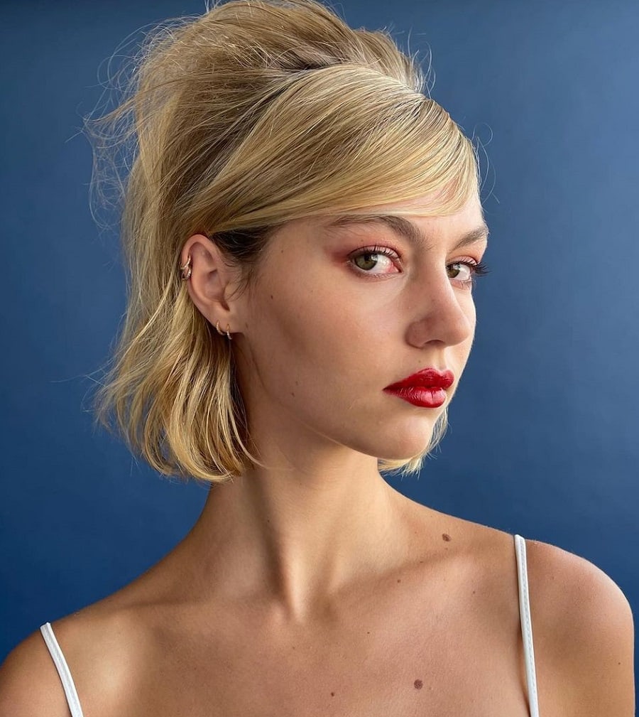 beehive hairstyle with blonde bob